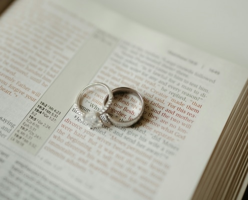 Wedding rings symbolizing God’s faithfulness and the union of man and woman at Victory Chapel in New Hampshire.